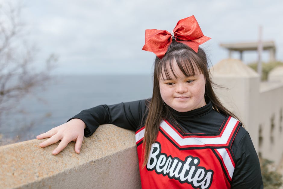 Metabolic Syndrome Detection: Can Laboratory Tests Catch It Early a young cheerleader with down syndrome poses confidently out