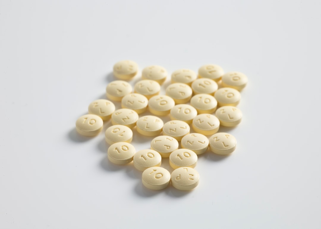 Vitamin B12 Testing and Supplementation for Vegans and Vegetarians round yellow medication pill lot