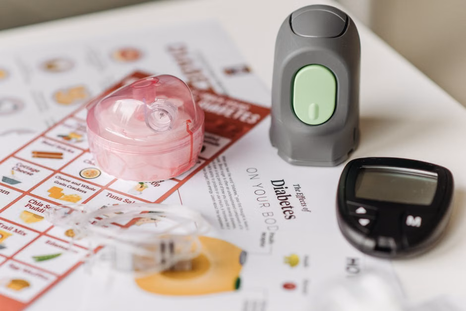 Prediabetes Detection: Early Biomarkers Before Diabetes Diagnosis Close-up of blood sugar monitoring devices and educational materials for diabetes care.