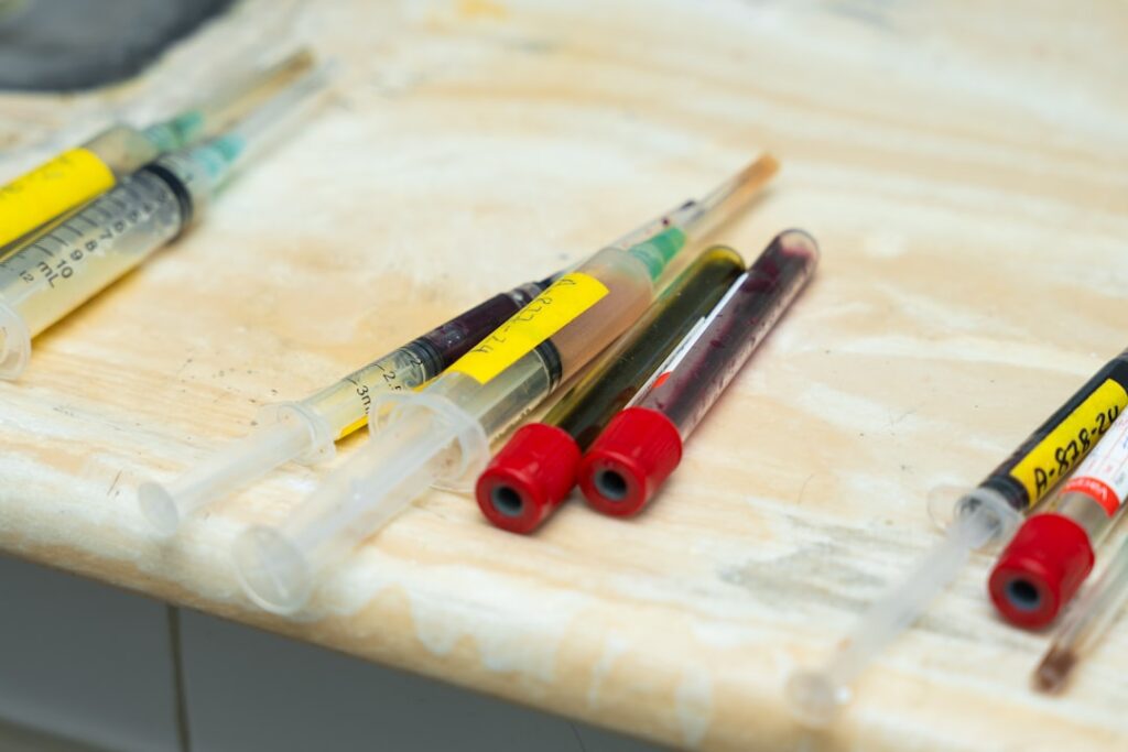 Liver Function Tests: AST, ALT, Bilirubin, and Albumin Explained a group of medical supplies sitting on top of a counter